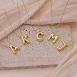 Inerney Gold Bubble Letter Necklace