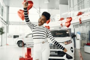 girl buying new car