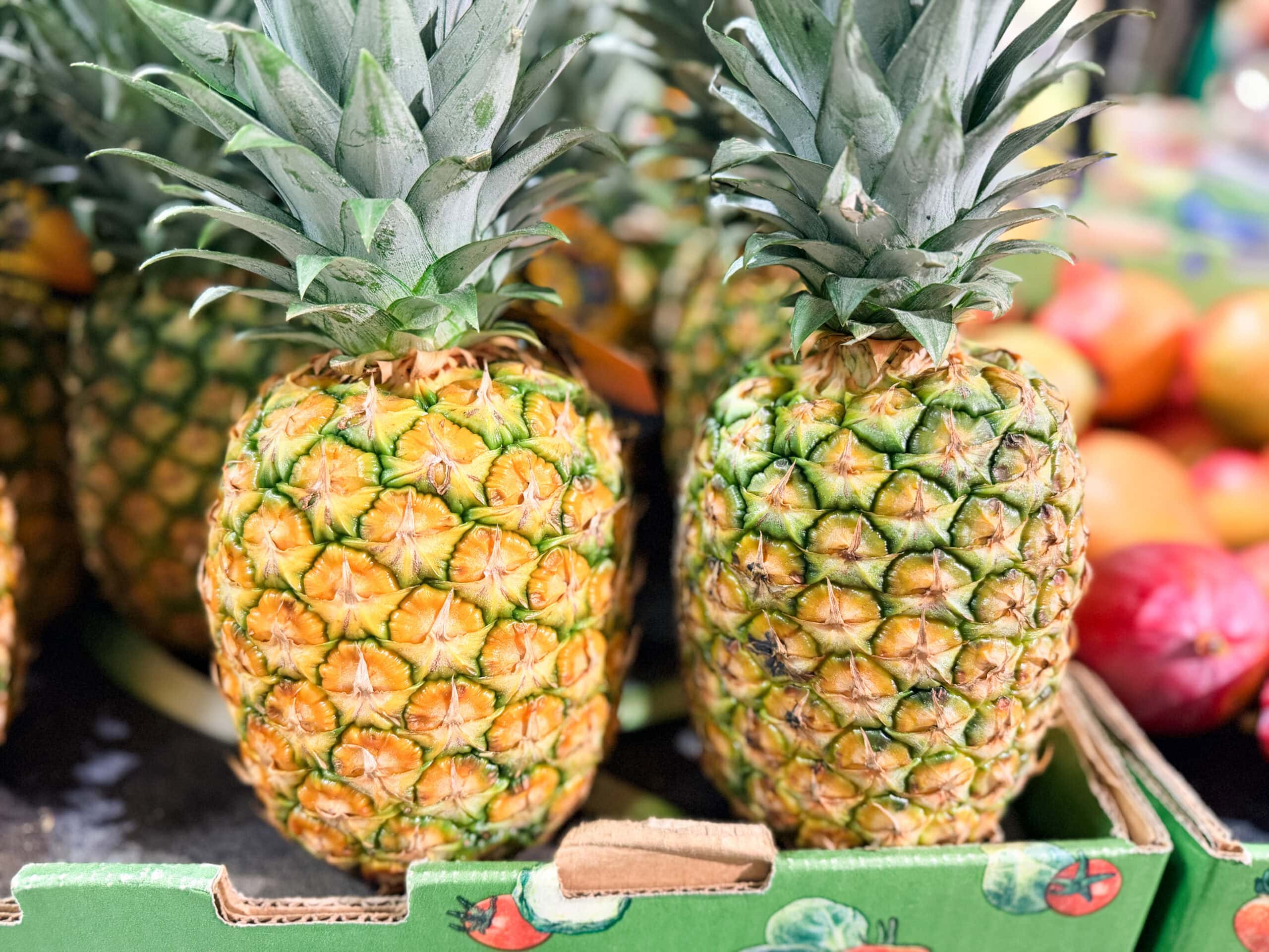 grocery store produce pineapples grocery store produce pineapples