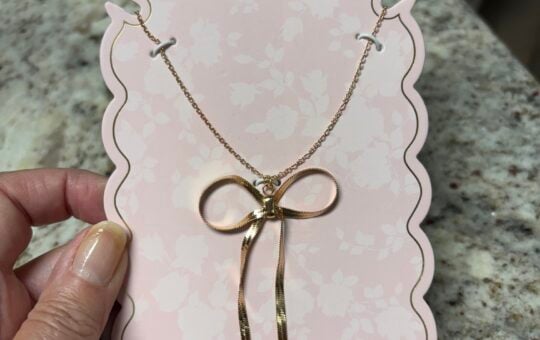 Celebrity pink bow necklace