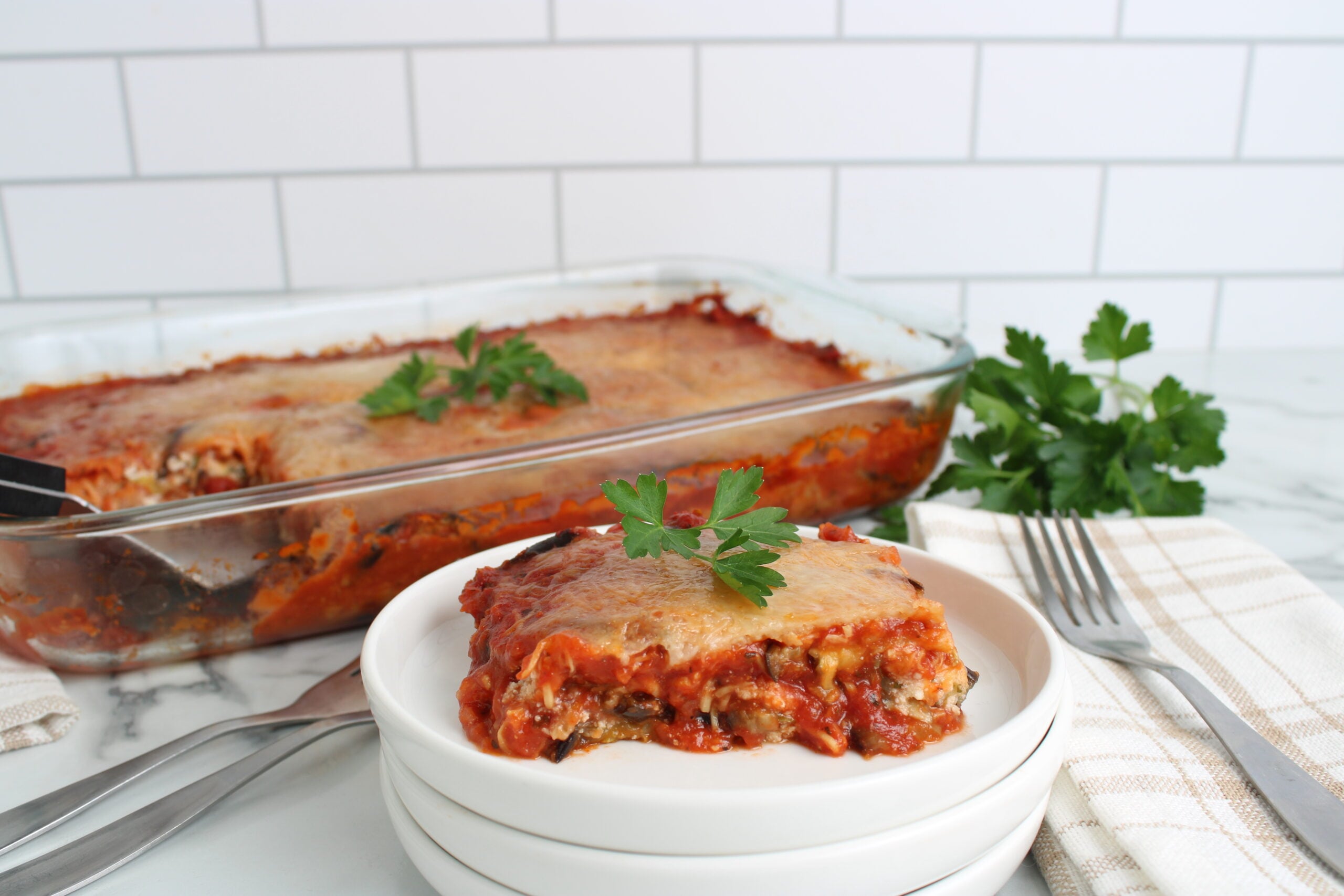 Lightened Up Eggplant Parmesan finished on plate