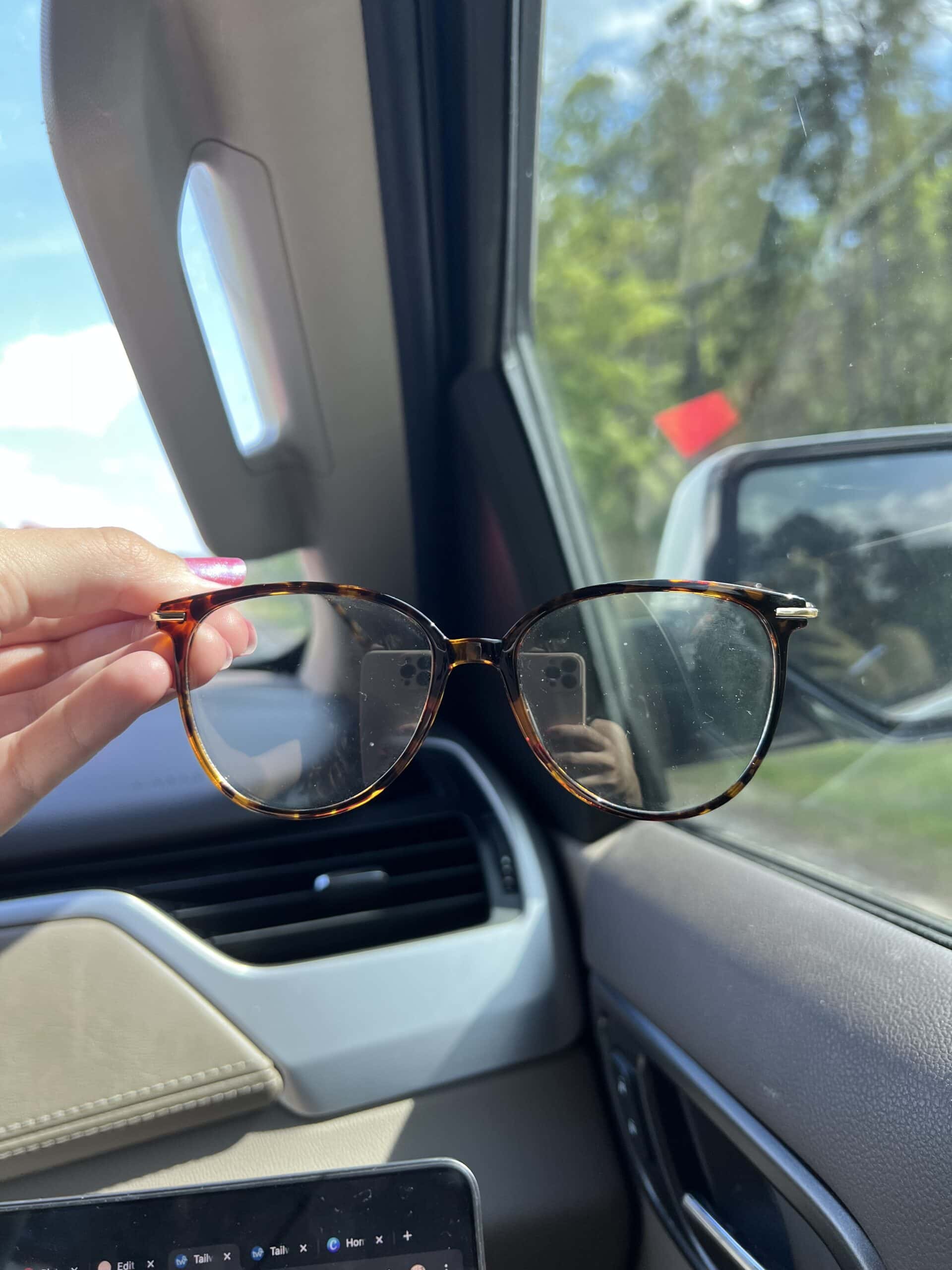 Person Holding Glasses Person Holding Glasses